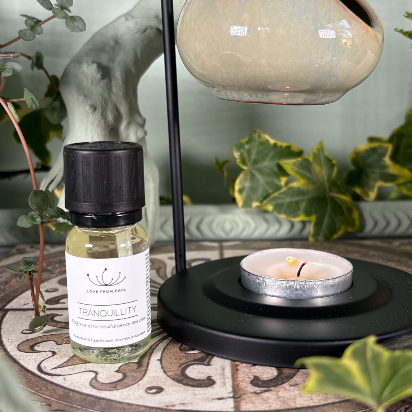 Hanging Teardrop Oil Burner On Metal Stand