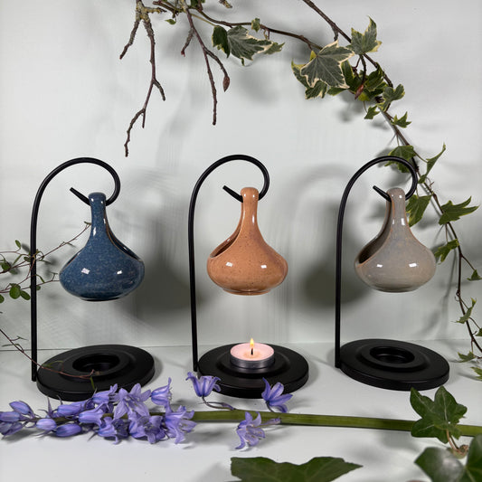Hanging Teardrop Oil Burner On Metal Stand