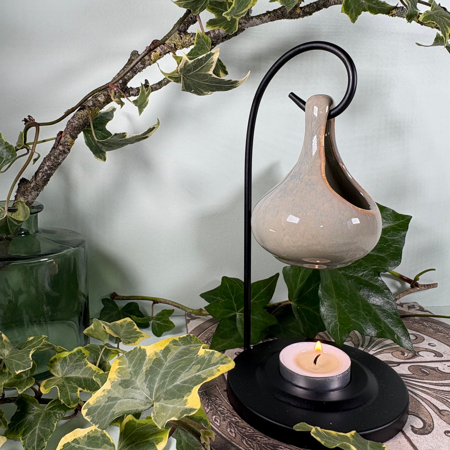 Hanging Teardrop Oil Burner On Metal Stand